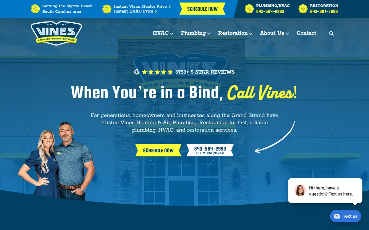 Vines Heating and Air home page with two team members beside the headline and a Schedule Now button