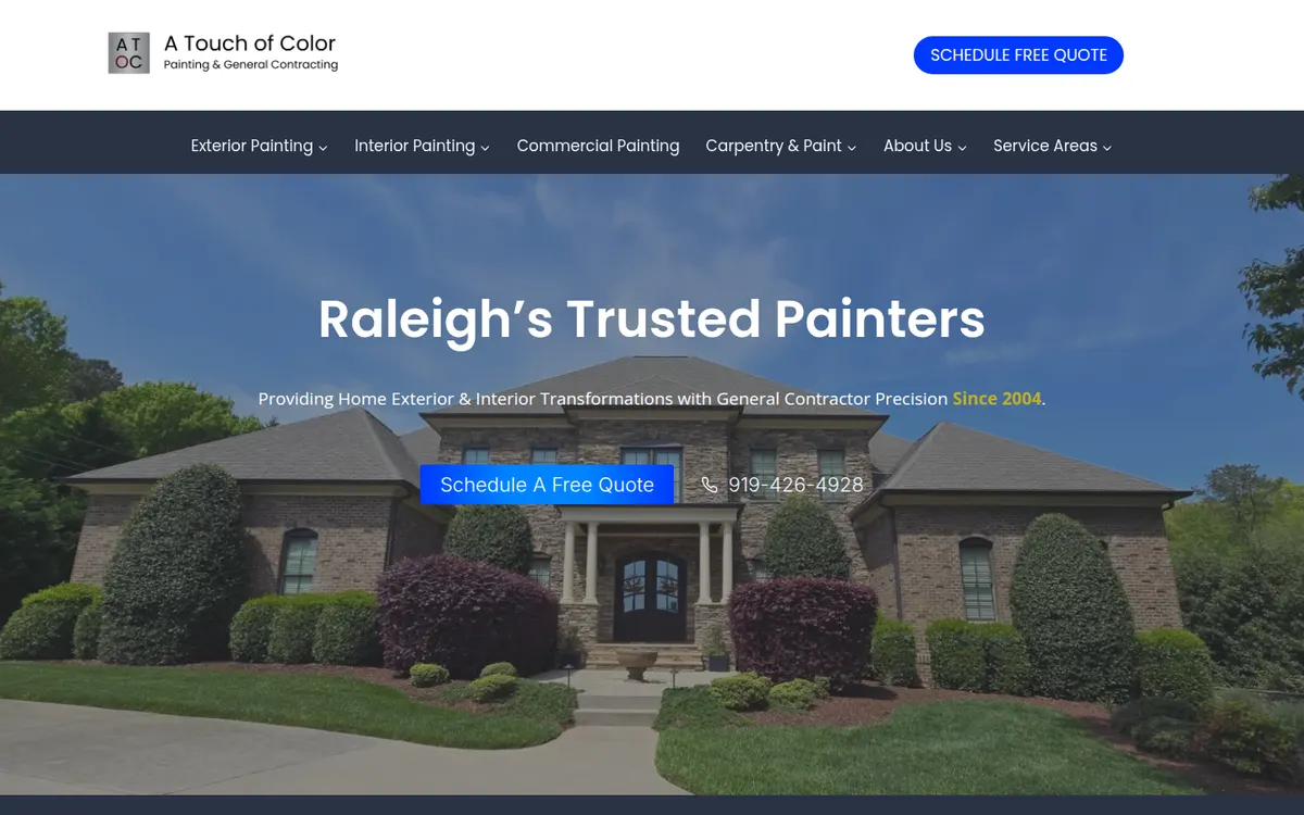 A Touch of Color home page with a finished brick house and a Schedule a Free Quote button
